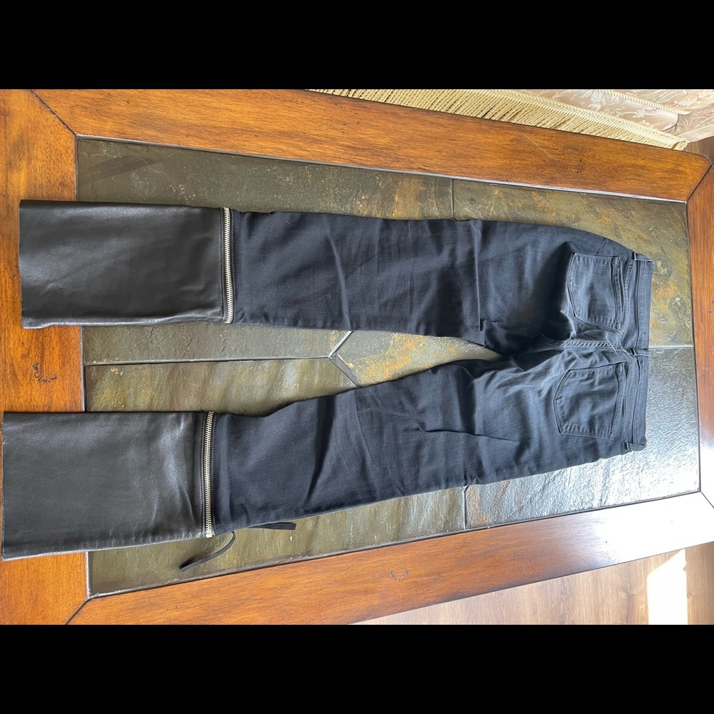 JBrand size 27 black stretch jeans with leather cuff.